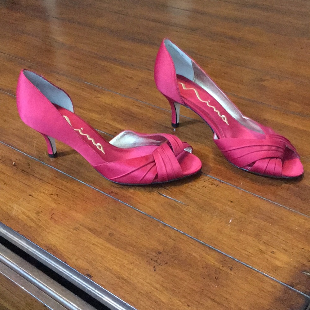 Red satin pumps with genuine leather sole